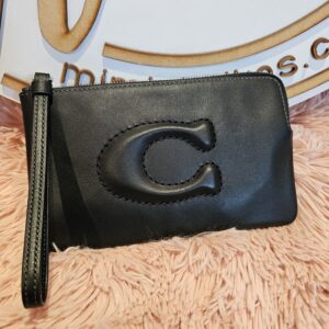 Coach Wristlet logo en relieve